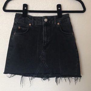 Black denim mini skirt